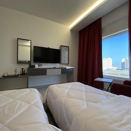 Alfalak Hotel Seeb Buitenkant foto